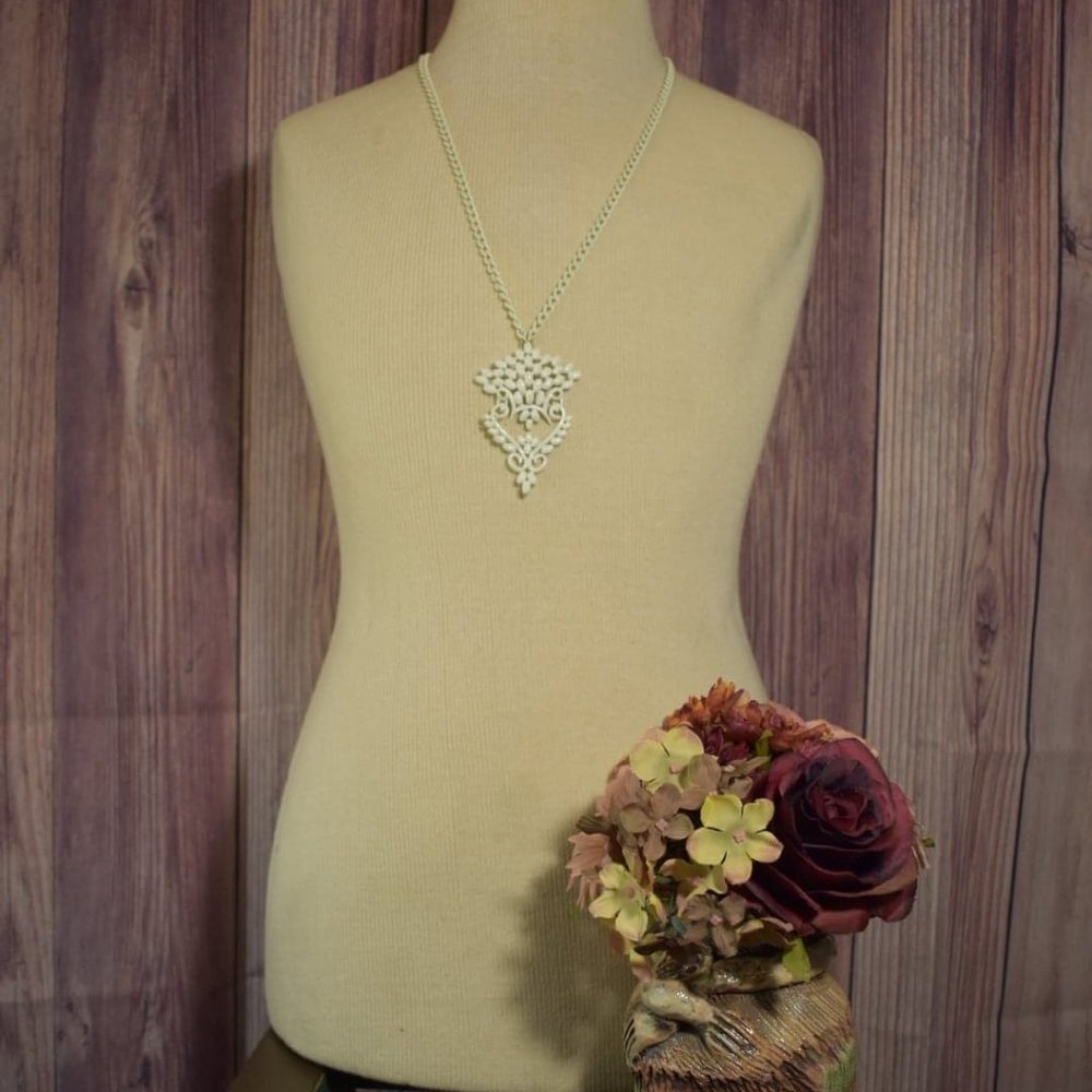 Monet White enamel necklace.